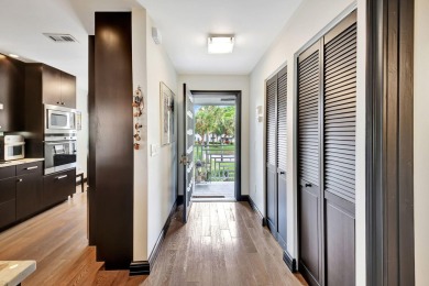 Beautifully updated second-floor, two-bedroom, two-bath on Hunters Run Golf and Country Club in Florida - for sale on GolfHomes.com, golf home, golf lot