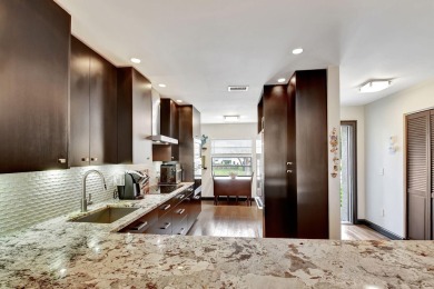 Beautifully updated second-floor, two-bedroom, two-bath on Hunters Run Golf and Country Club in Florida - for sale on GolfHomes.com, golf home, golf lot
