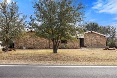 Nestled in the prestigious Pecan Plantation Country Club (PPCC) on Pecan Plantation Country Club in Texas - for sale on GolfHomes.com, golf home, golf lot