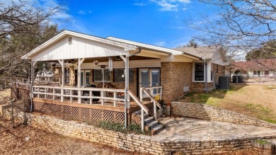 Nestled in the prestigious Pecan Plantation Country Club (PPCC) on Pecan Plantation Country Club in Texas - for sale on GolfHomes.com, golf home, golf lot