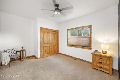 Perched on the peaceful shores of Sans Souci Lake, this on Stoneridge Golf Club in Idaho - for sale on GolfHomes.com, golf home, golf lot
