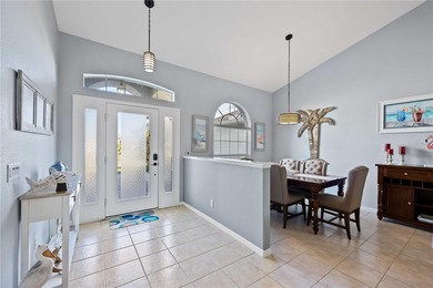 Welcome to this move-in ready saltwater pool home in Rotonda on Pinemoor West Golf Club in Florida - for sale on GolfHomes.com, golf home, golf lot