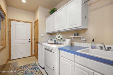 Perched on the peaceful shores of Sans Souci Lake, this on Stoneridge Golf Club in Idaho - for sale on GolfHomes.com, golf home, golf lot