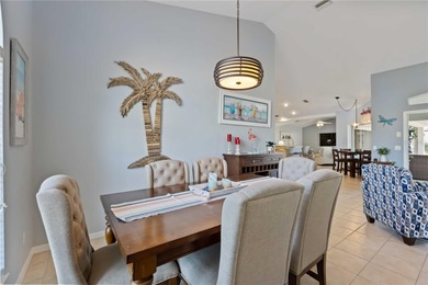 Welcome to this move-in ready saltwater pool home in Rotonda on Pinemoor West Golf Club in Florida - for sale on GolfHomes.com, golf home, golf lot