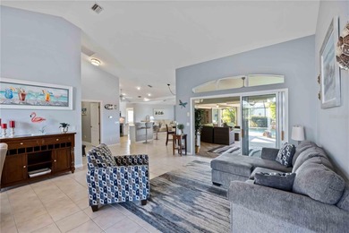 Welcome to this move-in ready saltwater pool home in Rotonda on Pinemoor West Golf Club in Florida - for sale on GolfHomes.com, golf home, golf lot