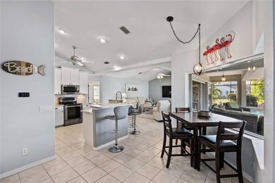 Welcome to this move-in ready saltwater pool home in Rotonda on Pinemoor West Golf Club in Florida - for sale on GolfHomes.com, golf home, golf lot