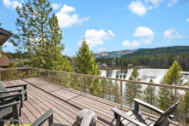 Perched on the peaceful shores of Sans Souci Lake, this on Stoneridge Golf Club in Idaho - for sale on GolfHomes.com, golf home, golf lot