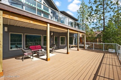 Perched on the peaceful shores of Sans Souci Lake, this on Stoneridge Golf Club in Idaho - for sale on GolfHomes.com, golf home, golf lot