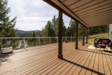 Perched on the peaceful shores of Sans Souci Lake, this on Stoneridge Golf Club in Idaho - for sale on GolfHomes.com, golf home, golf lot