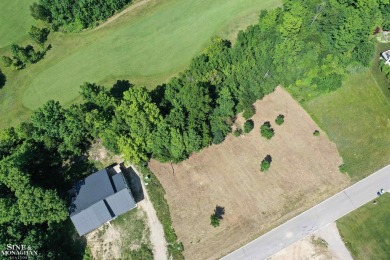 Are you looking to build your dream home with views of Grand on Lochen Heath Golf Course in Michigan - for sale on GolfHomes.com, golf home, golf lot