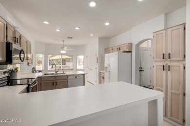Bright and inviting, this move-in ready home comes fully on Trail Ridge Golf Course in Arizona - for sale on GolfHomes.com, golf home, golf lot