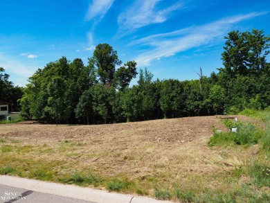 Are you looking to build your dream home with views of Grand on Lochen Heath Golf Course in Michigan - for sale on GolfHomes.com, golf home, golf lot