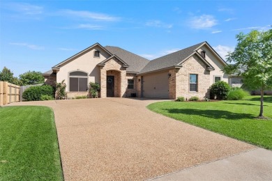Privacy of gated community and golf course views are just two on The Lake Country Club - Lake Waco in Texas - for sale on GolfHomes.com, golf home, golf lot