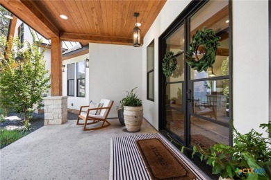 This stunning property offers a perfect blend of tranquility and on Slick Rock Golf Course - Horseshoe Bay in Texas - for sale on GolfHomes.com, golf home, golf lot
