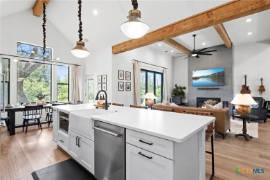 This stunning property offers a perfect blend of tranquility and on Slick Rock Golf Course - Horseshoe Bay in Texas - for sale on GolfHomes.com, golf home, golf lot