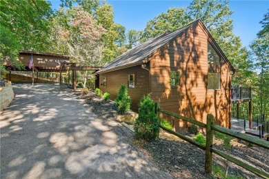 Nestled in the heart of the breathtaking Big Canoe mountain on Big Canoe Golf Club - Cherokee in Georgia - for sale on GolfHomes.com, golf home, golf lot