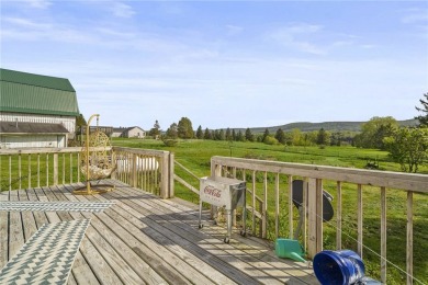 Nestled on Dryden Lake, just outside the village of Dryden on Dryden Lake Golf Club in New York - for sale on GolfHomes.com, golf home, golf lot
