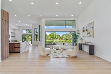 RARELY AVAILABLE COMPLETELY REMODELED CONTEMPORARY SINGLE FAMILY on Breakers Rees Jones Course in Florida - for sale on GolfHomes.com, golf home, golf lot