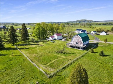 Nestled on Dryden Lake, just outside the village of Dryden on Dryden Lake Golf Club in New York - for sale on GolfHomes.com, golf home, golf lot