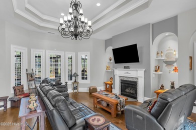 Experience luxury living at its finest in this beautifully on Ocean Ridge Plantation in North Carolina - for sale on GolfHomes.com, golf home, golf lot