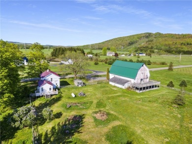 Nestled on Dryden Lake, just outside the village of Dryden on Dryden Lake Golf Club in New York - for sale on GolfHomes.com, golf home, golf lot