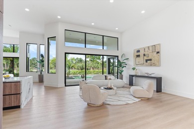 RARELY AVAILABLE COMPLETELY REMODELED CONTEMPORARY SINGLE FAMILY on Breakers Rees Jones Course in Florida - for sale on GolfHomes.com, golf home, golf lot