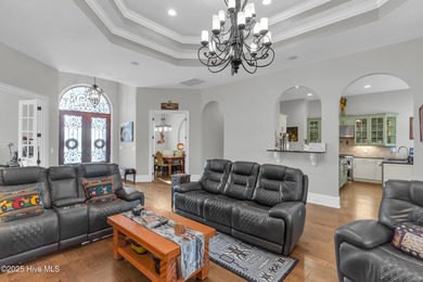 Experience luxury living at its finest in this beautifully on Ocean Ridge Plantation in North Carolina - for sale on GolfHomes.com, golf home, golf lot