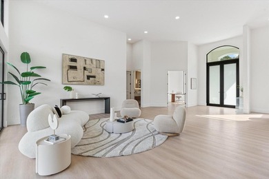 RARELY AVAILABLE COMPLETELY REMODELED CONTEMPORARY SINGLE FAMILY on Breakers Rees Jones Course in Florida - for sale on GolfHomes.com, golf home, golf lot