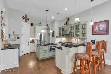 Experience luxury living at its finest in this beautifully on Ocean Ridge Plantation in North Carolina - for sale on GolfHomes.com, golf home, golf lot