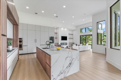 RARELY AVAILABLE COMPLETELY REMODELED CONTEMPORARY SINGLE FAMILY on Breakers Rees Jones Course in Florida - for sale on GolfHomes.com, golf home, golf lot