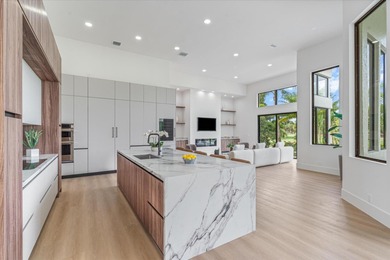 RARELY AVAILABLE COMPLETELY REMODELED CONTEMPORARY SINGLE FAMILY on Breakers Rees Jones Course in Florida - for sale on GolfHomes.com, golf home, golf lot