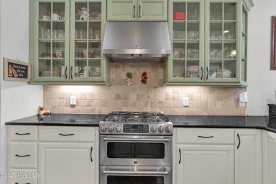 Experience luxury living at its finest in this beautifully on Ocean Ridge Plantation in North Carolina - for sale on GolfHomes.com, golf home, golf lot