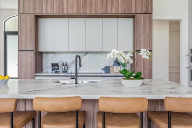 RARELY AVAILABLE COMPLETELY REMODELED CONTEMPORARY SINGLE FAMILY on Breakers Rees Jones Course in Florida - for sale on GolfHomes.com, golf home, golf lot