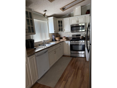 #280 has an especially serene and lovely fairway view shaded by on Suncrest Country Club in California - for sale on GolfHomes.com, golf home, golf lot