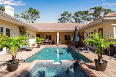 Welcome to timeless elegance and modern comfort in The Oaks on The Oaks Club in Florida - for sale on GolfHomes.com, golf home, golf lot