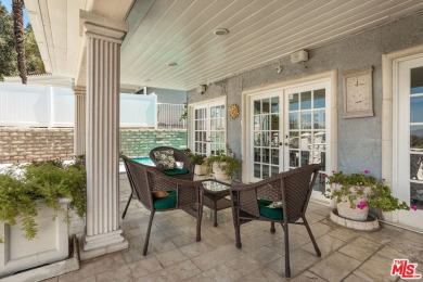 This exceptionally rare two-story view home is on the market for on Woodland Hills Country Club in California - for sale on GolfHomes.com, golf home, golf lot