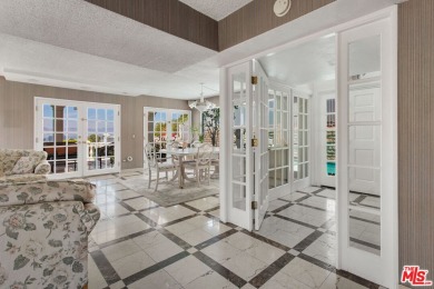 This exceptionally rare two-story view home is on the market for on Woodland Hills Country Club in California - for sale on GolfHomes.com, golf home, golf lot