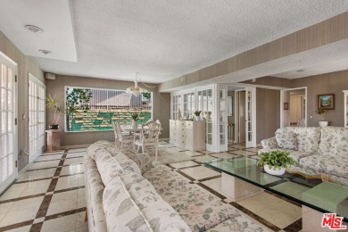This exceptionally rare two-story view home is on the market for on Woodland Hills Country Club in California - for sale on GolfHomes.com, golf home, golf lot