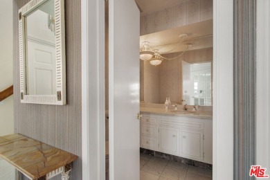 This exceptionally rare two-story view home is on the market for on Woodland Hills Country Club in California - for sale on GolfHomes.com, golf home, golf lot