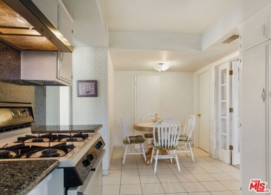 This exceptionally rare two-story view home is on the market for on Woodland Hills Country Club in California - for sale on GolfHomes.com, golf home, golf lot