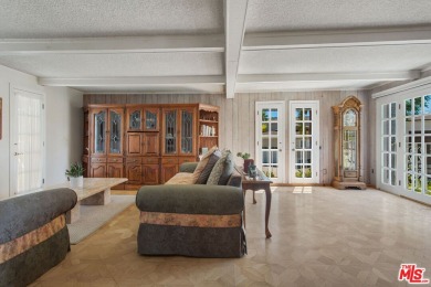 This exceptionally rare two-story view home is on the market for on Woodland Hills Country Club in California - for sale on GolfHomes.com, golf home, golf lot