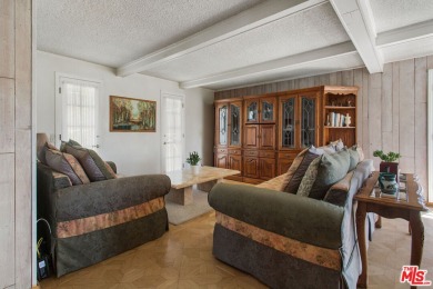 This exceptionally rare two-story view home is on the market for on Woodland Hills Country Club in California - for sale on GolfHomes.com, golf home, golf lot