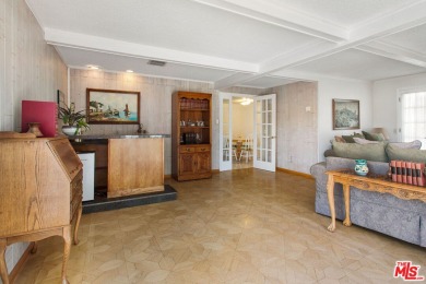 This exceptionally rare two-story view home is on the market for on Woodland Hills Country Club in California - for sale on GolfHomes.com, golf home, golf lot