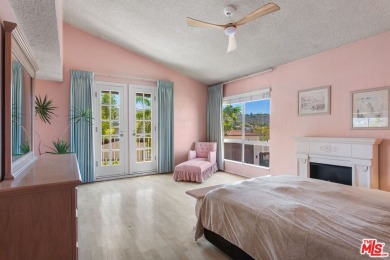 This exceptionally rare two-story view home is on the market for on Woodland Hills Country Club in California - for sale on GolfHomes.com, golf home, golf lot