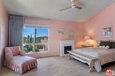This exceptionally rare two-story view home is on the market for on Woodland Hills Country Club in California - for sale on GolfHomes.com, golf home, golf lot