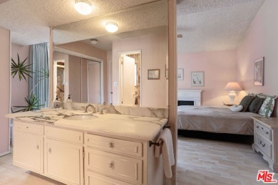 This exceptionally rare two-story view home is on the market for on Woodland Hills Country Club in California - for sale on GolfHomes.com, golf home, golf lot
