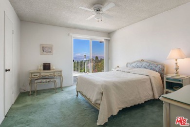 This exceptionally rare two-story view home is on the market for on Woodland Hills Country Club in California - for sale on GolfHomes.com, golf home, golf lot