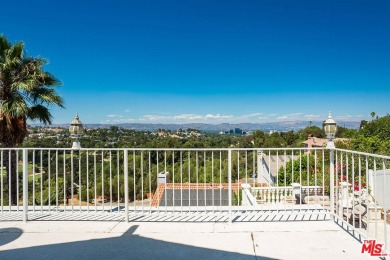 This exceptionally rare two-story view home is on the market for on Woodland Hills Country Club in California - for sale on GolfHomes.com, golf home, golf lot