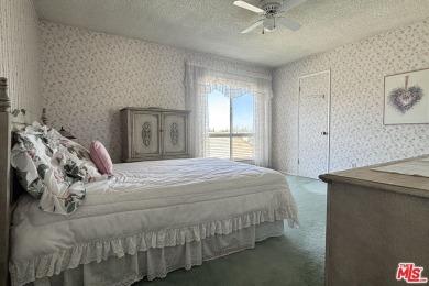 This exceptionally rare two-story view home is on the market for on Woodland Hills Country Club in California - for sale on GolfHomes.com, golf home, golf lot