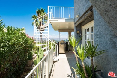 This exceptionally rare two-story view home is on the market for on Woodland Hills Country Club in California - for sale on GolfHomes.com, golf home, golf lot